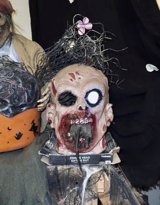 Animated halloween zombie head
