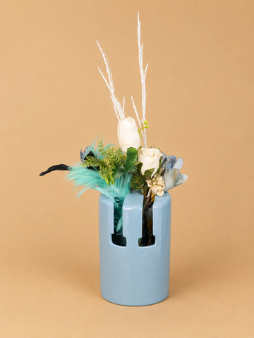 Modern Botanical Arrangement in Blue Ceramic Vase