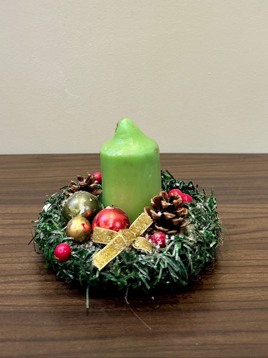 Green candle Christmas centrepiece
