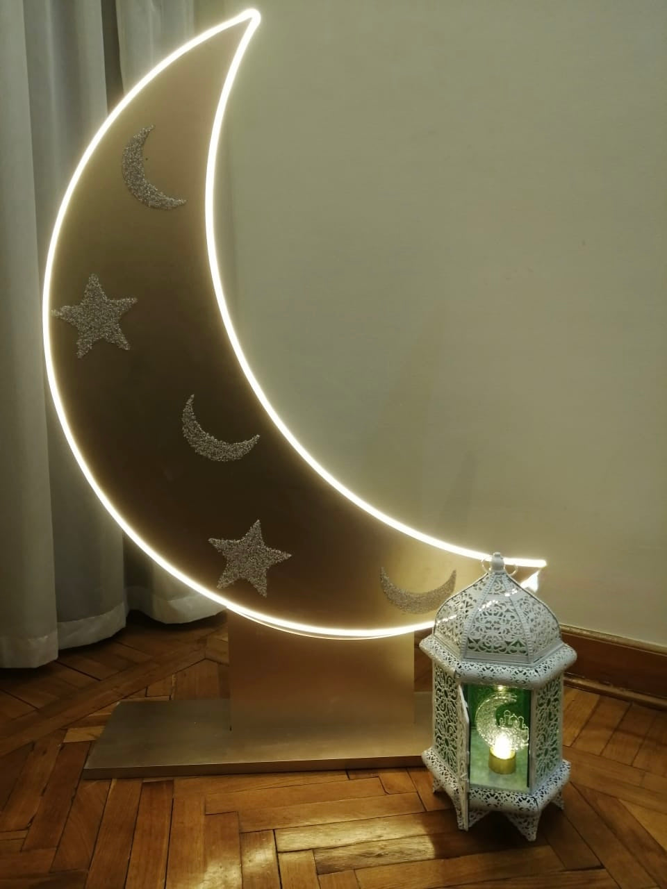 Glowing crescent with an ornate lantern