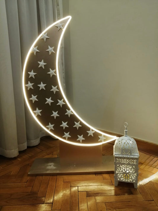 Golden crescent adorned with white stars