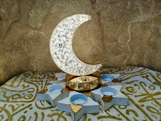 Crystal crescent moon on a gold base