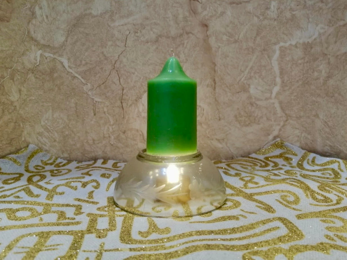 Green candle with holder