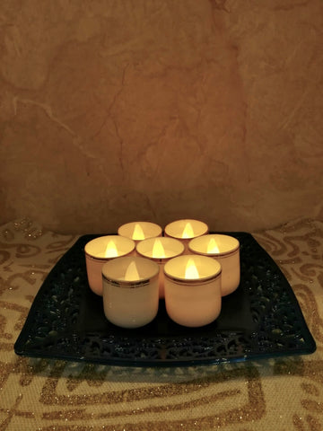 Set of seven candle cups