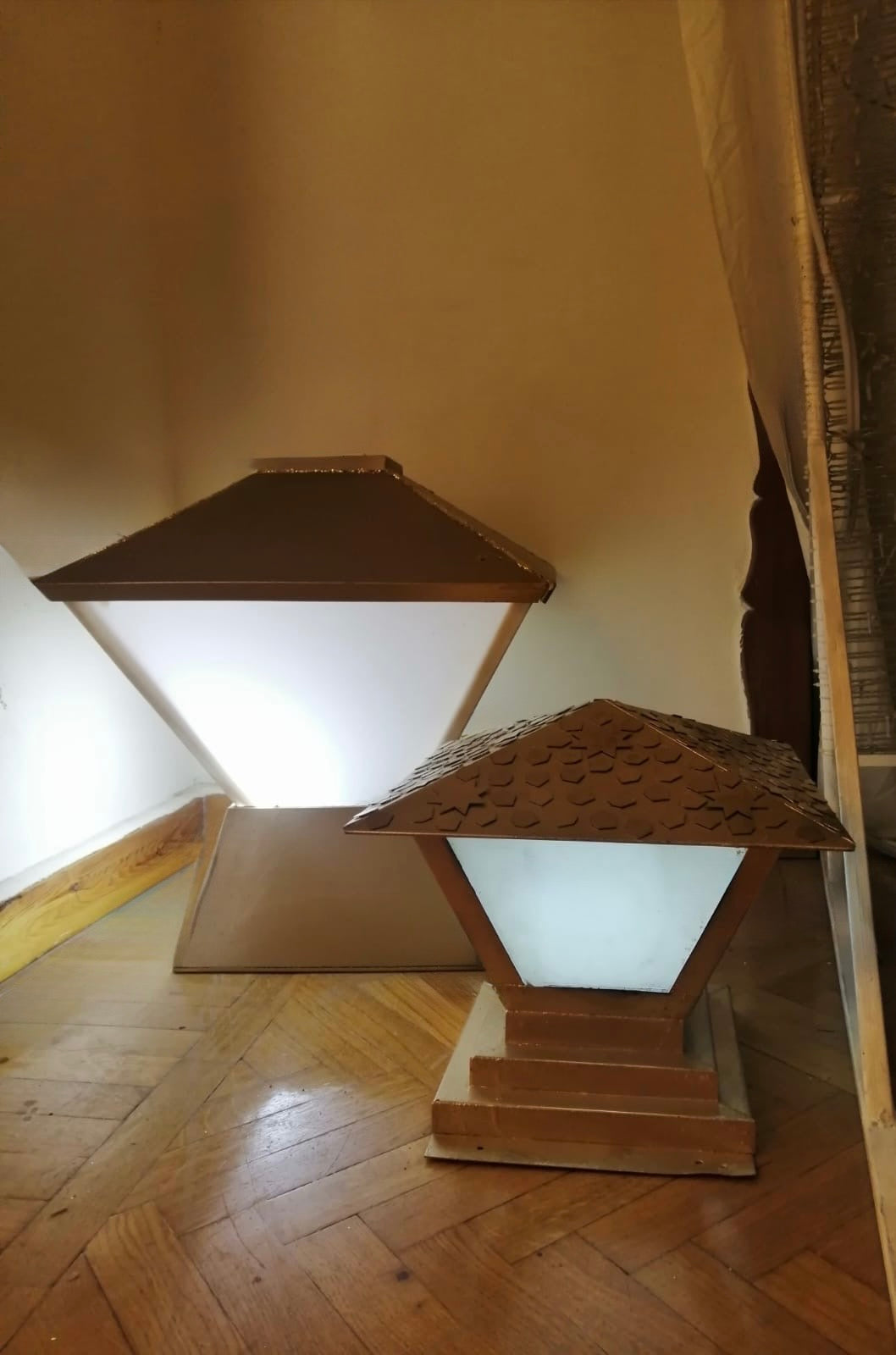 Bronze and white lanterns